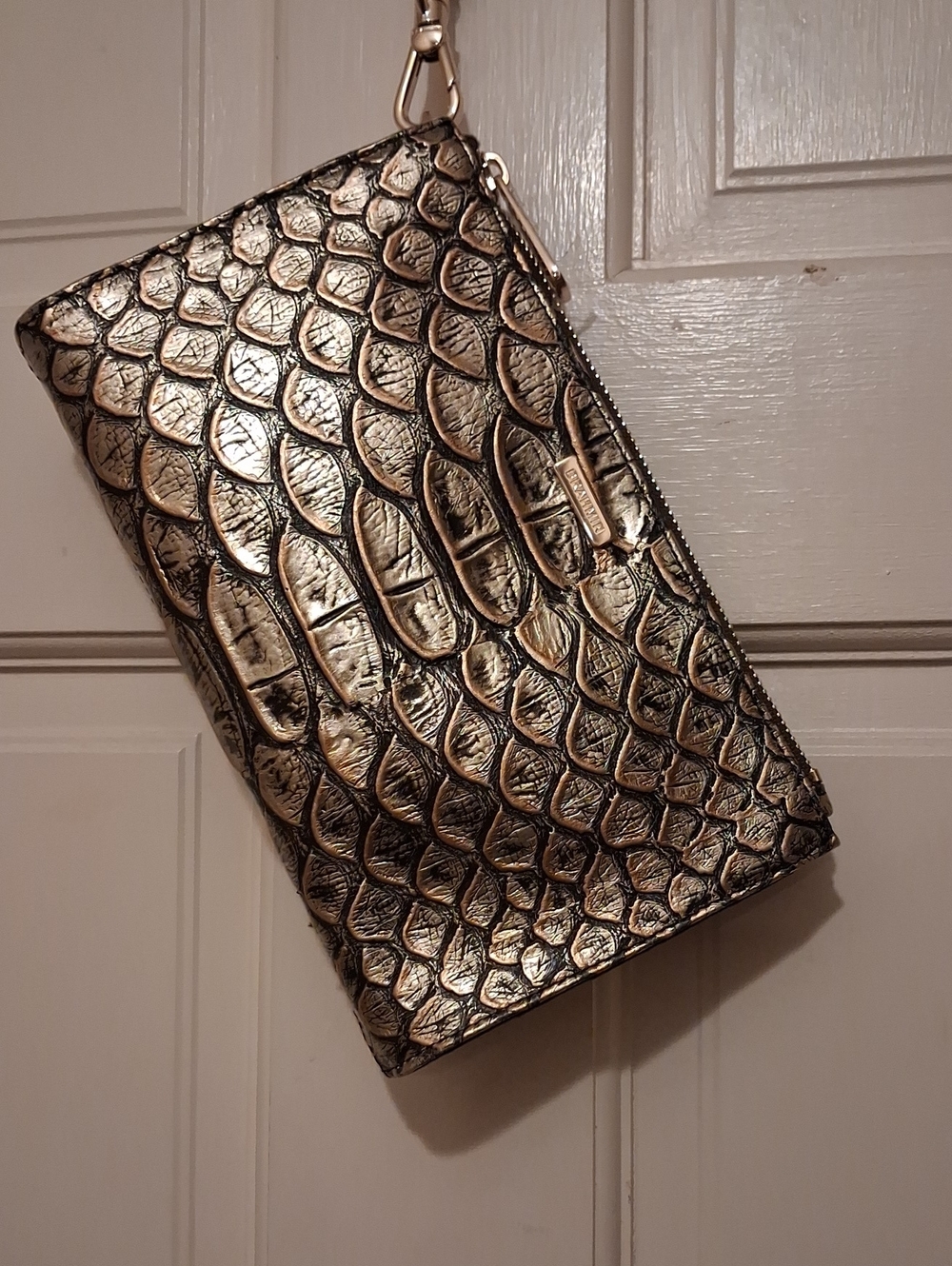 Brahmin Daisy leather Wristlet.gold And Black Hues.